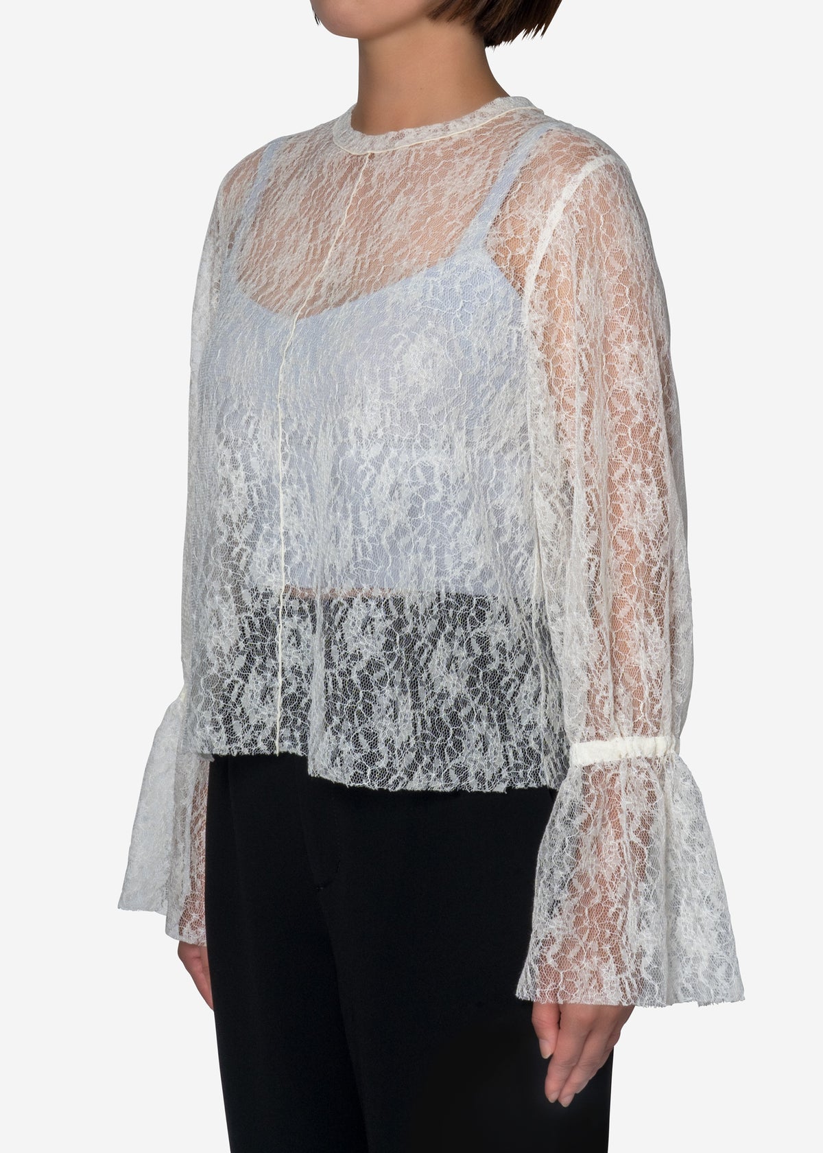 Wool Lace Flare Top in Off White Greed International を買い物し